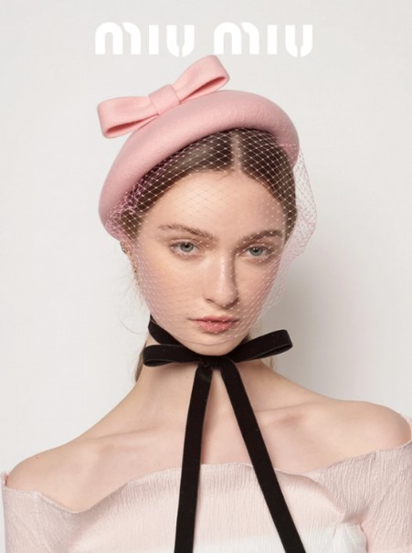 Miu Miu research reference with a pink bow hat