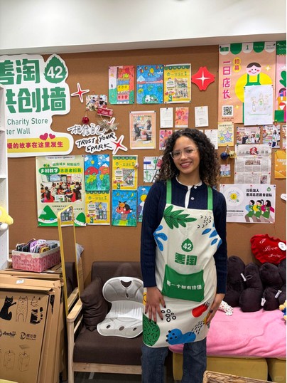 Portrait reference in a Shantao shop with an apron and community wall